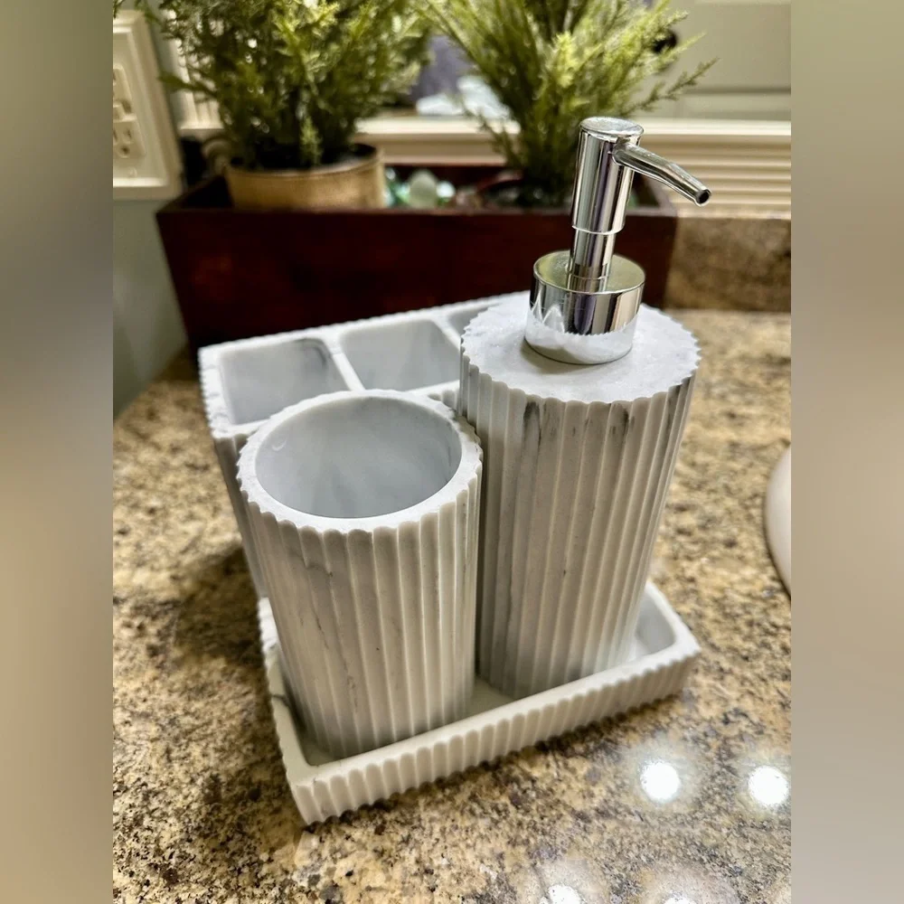 WHITE FLUTED FAUX, MARBLE BATH ACCESSORIES. CLEAN LINES & TIMELESS LUXURY.